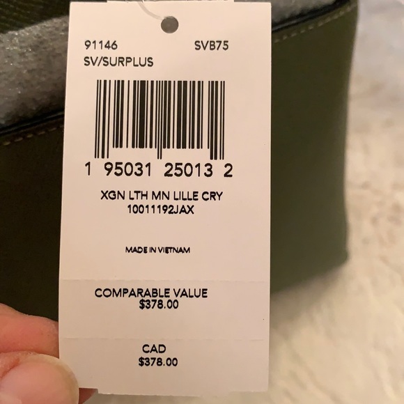 NWT. Coach Minicarryall - Picture 4 of 7